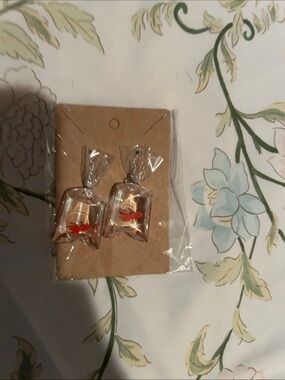 Gold Fish-in-Bag Earrings with Orange Accent